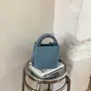 Bolso tipo cubo único y elegante para mujer, nueva versión coreana primavera 2026, bolso de hombro simple, bolso cruzado casual de moda