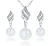 Joyería de boda para novia Moda europea y americana Cadena retorcida de perla y diamante simple Pendientes collar set de joyería Al por mayor