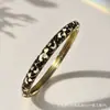 Pulsera floral de vid transfronteriza europea y americana con lazo, esmalte cloisonné, esmalte vintage, goteo de aceite, adornada con diamantes, diseño único