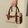 Bolso de gamuza para mujer, nuevo modelo de otoño 2026, bolso de mano vintage de alta gama para el día a día, exquisito bolso de hombro y cruzado