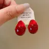 Pendientes de borla con carcasa de madera marrón transfronterizos europeos y americanos, pendientes de estilo vintage Maillard, pendientes de mujer de lujo ligero de alta gama