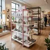 Panel Trasero de Madera de Isla Rosa de Doble Cara Estantes de Acero y Madera para Tiendas para Madres y Bebés, Tiendas de Conveniencia, Estantes de Exhibición y Estantes Mniso