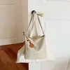 Bolso de hombro de diseño de nicho estilo coreano transfronterizo, moda retro para el día a día, para mujer, color liso, moderno, casual, bandolera tipo cubo