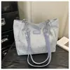 Bolsa Tote de Gran Capacidad Nueva Primavera y Verano 2026 Versátil para el Trabajo Hombro Axila Bolso de Mano con Textura Simple