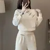 Nuevo conjunto casual estilo chino para mujer, diseño de otoño, color liso, sudadera con cuello alto de botones + pantalones largos de pierna ancha conjunto de dos piezas