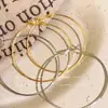 Brincos de Argola Grande Dourados Minimalistas Elegantes de Alta Qualidade para Socialites Ear Cuffs Finos Versáteis Brincos Grandes Modernos