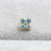 Pendientes de aleación de titanio ASTMF-13 flor de cuatro pétalos de circonita ultra brillante dorados Perforación de labio de circonita con rosca interna de titanio G23
