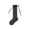 Calcetines Altos de Color Sólido para Niñas de Primavera y Otoño con Lazo Trasero, Calcetines Negros y Blancos con Volantes de Mariposa para Niños, Estilo Princesa al por Mayor
