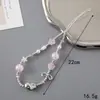 Cadena para teléfono de perlas estilo Chanel Colgante de flor pequeña Cordón para teléfono Funda para teléfono Accesorio con cuentas Cadena anticaídas para mujer