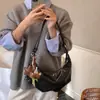 Bolsa Texturizada de Alta Qualidade Tendência 2025 para Mulheres Outono e Inverno Versátil Retrô Bolsa de Ombro de Nicho Bolsa Transversal para o Dia a Dia
