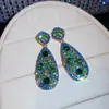 Brincos de Tarraxa Flor Gota d'Água com Strass Cruzados Europeus e Americanos Temperamento Exagerado Versátil Leve Luxo Sensação de Alta Qualidade Acessórios de Brincos para Mulheres Atacado