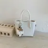 Bolso Cubo Casual de Nicho Retro de Moda 2026 Otoño Nuevo Color Sólido Ligero para Viajes Cruzado al Hombro