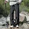 Pantalones casuales nuevos para hombre, ropa de trabajo estilo americano, pantalones largos casuales de tejido, pierna ancha, corte holgado, cintura elástica, pantalones casuales versátiles