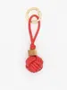 Chaveiro Simples de Corda Trançada Feito à Mão com Cordão de Couro PU, Contas de Madeira e Logo, Pequeno Acessório para Decoração de Bolsa