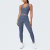 Conjunto de outfit de yoga ajustado con diseño deportivo en la espalda, de tela cepillada con bloques de color transfronterizos, sensación nude, pantalones largos de cintura alta para levantar glúteos para correr y fitness
