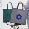 Loja de Roupas Bolsa de Mão Não Tecida Logo Personalizado Simples Espessada Embalagem de Presente Bolsa de Mão Roupas Bolsa de Proteção Ambiental