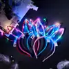 Diadema luminosa de empuje navideña al por mayor regalo puesto del mercado nocturno puesto de diademas tocado de orejas de conejo con plumas juguete