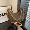 Bolsa da lua tendência de design nicho estilo coreano nova primavera 2026 moda vintage corrente ombro transversal axila