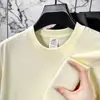 Camiseta de algodón puro de manga corta para verano para hombre, transpirable y de corte holgado, camiseta de cuello redondo para jóvenes y adultos de mediana edad, top versátil y moderno de color liso