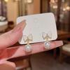 Pendientes de plata S925 con forma de aguja, estilo coreano, con nuevas flores y perlas, para mujer, estilo TikTok, diseño simple y elegante.