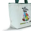 Bolsa de lona compacta de dibujos animados para mujer, nuevo bolso de mano primavera/verano 2026, bolsa de almacenamiento portátil para oficinistas, venta al por mayor personalizada