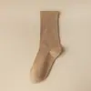 Calcetines para mujer primavera y otoño Cuatro Estaciones calcetines de media pantorrilla color liso desodorantes absorbentes de sudor estilo ins japonés calcetines de rizo para confinamiento venta al por mayor