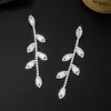 Joyería de comercio exterior Pendientes de pedrería blanca más circonita AB Cadena de garra de ojo de mai Pendientes brillantes para tiendas nocturnas fabricantes al por mayor E800