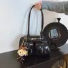 Bolsa de Axila Retrô de Nicho para Mulheres Outono/Inverno 2025 Nova Versátil Tendência Coreana Bolsa de Ombro Bolsa de Bowling de Grande Capacidade