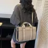 Bolso de Moda de Gran Capacidad para Mujer 2026 Nuevo Modelo para el Trabajo y los Viajes Diarios Bolso Tote de Lona con Correa Ancha Bolso Tote de Hombro Único Cruzado