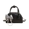 Bolso de mano único, casual y elegante, tipo concha para mujer, nuevo modelo primavera 2026, bolso de hombro y cruzado de lujo ligero de alta calidad