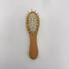 Mini Peine Masajeador Portátil con Airbag de Madera Maciza Natural Mini Peine de Palma Peine de Bolsillo para Masaje del Cuero Cabelludo Peine de Madera
