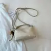 Bolso pequeño tejido de verano para mujer 2026, nuevo bolso cruzado de alta estética, bolso de mano tipo almohada, bolso tote pequeño para mujer