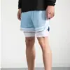 Pantalones Cortos Transfronterizos para Hombre de Verano Sueltos de Cinco Puntos Pantalones Deportivos de Entrenamiento Falsos de Dos Piezas Pantalones de Fitness Venta al por Mayor