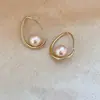 Brincos Redondos de Pérola Estilo Retrô Francês para Mulheres Modernos Design de Nicho Gancho de Orelha Exquisitos Simples Versáteis Brincos de Tarraxa Ornamentos de Orelha