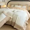 Juego de cuatro piezas para dormitorio de algodón sateen 100% algodón de fibra larga de alta gama clase A bordado estilo lujo ligero algodón puro ropa de cama para todas las estaciones