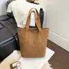 Bolsa de lona para mujer 2026 nueva popular moda de otoño estudiante escolar viajero bolso de hombro bolsa de mano de gran capacidad