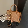 Bolsa de ombro casual para o dia a dia, lona com poá, estilo novo, design coreano, bolsa de nicho, bolsa tipo balde 2026, grande capacidade, bolsa feminina