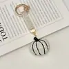 Nuevo Llavero de Calabaza de Diamantes Completos de Cristal Halloween Creativo Strass Moda Colgante de Bolso Adorno para Llave de Coche