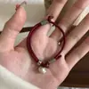Pulseira de Prata 999 com Ruyi de Caqui e Cordão Vermelho para Homens e Mulheres Novo Estilo Chinês Tibetano Cordão Vermelho para o Ano do Dragão