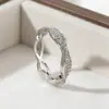 Anillo de cuerda retorcida de diseño único con circonita, disponible en oro y plata, accesorio hueco para mujer, joyería al por mayor transfronteriza