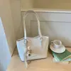Bolso con diseño de nicho de moda, gran capacidad, bolso de hombro único para debajo del brazo para mujer, nuevo bolso tote de moda 2026 para salir