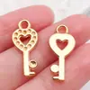 Mezcla 100 retro cinco colores corazón llave trébol de cuatro hojas llave aleación colgante hecho a mano diy accesorios de joyería venta al por mayor