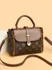 Bolsa de Mano Versátil de Alta Gama Estilo Nuevo Primavera 2026 Venta al por Mayor Bolso de Hombro Texturizado Bolso Casual para Mujer Bolso Cruzado para Mujer