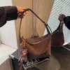 Bolso Pequeño Cuadrado Retro de Mano para Mujer 2025 Invierno Nuevo de Moda Simple de Aspecto Elegante Bolso Cruzado Casual para Hombro