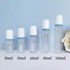 Botella de espuma transparente para mascotas con 30 dientes, 30 ml y 100 ml, limpiador facial, champú y espuma, lista para la venta.