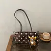 Bolso de mano de alta gama para mujer, nuevo y moderno 2026, bolso de hombro versátil para el día a día, bolso de axila de lujo ligero y elegante