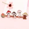 Europa y América Amazon broche de hongo broche de hongo niña planta antropomórfica creativa metal broche fábrica fuente venta al por mayor