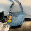 Bolso bandolera simple tipo bolsa de dumplings de mezclilla para mujer, moderno y versátil, bolso de hombro vintage 2026, bolso casual de mezclilla