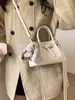 Bolso de Mano de Aspecto Elegante Estilo Coreano para Mujer Invierno 2026 Nuevo Estilo Coreano Retro Gamuza Gran Capacidad Bolso Cubo