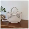 2026 Bolso de Mujer de Alta Calidad Nueva Moda Simple Versátil Bolsa de Comercio Exterior Hombro Único Viajero Diseño de Nicho Bolso Cruzado